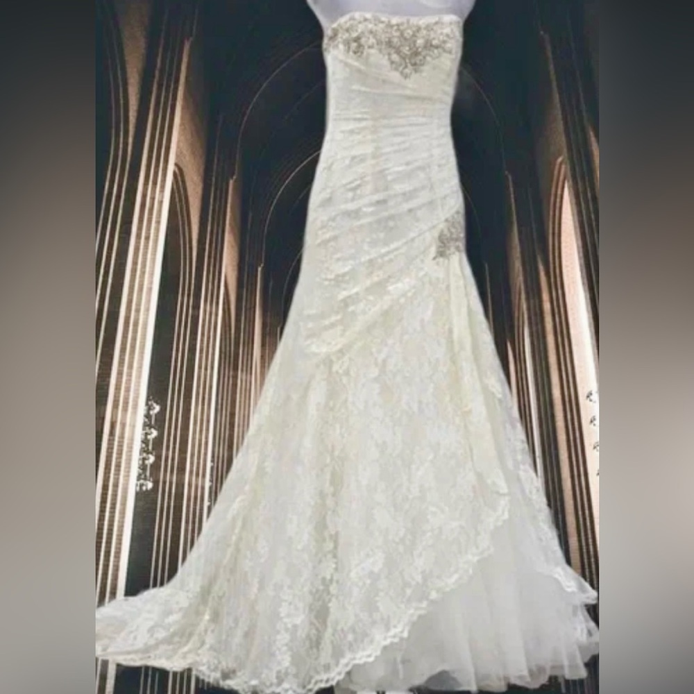 David's Bridal Lace Strapless Wedding Gown in the color “Ivory”.